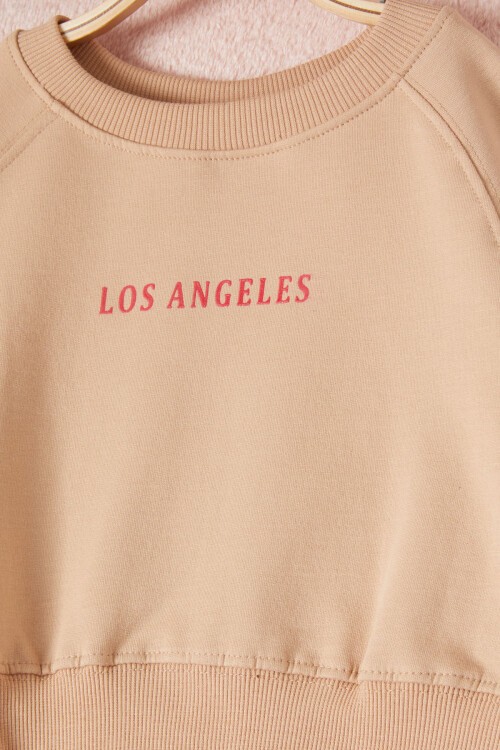 Krem Los Angeles Sırt Baskılı Yırtmaçlı Kız Çocuk Eşofman Takımı 16712