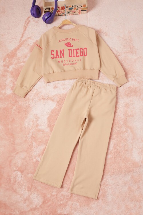 Krem Los Angeles Sırt Baskılı Yırtmaçlı Kız Çocuk Eşofman Takımı 16712